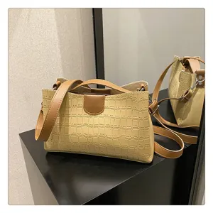 Women's crocodile pattern tote shoulder bag casual crossbody handbag with brown straps.