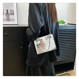 Stylish laser stone pattern chain shoulder bag for women, trendy casual crossbody handbag.