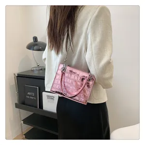 Pink laser crocodile pattern chain handbag detail view, stylish casual crossbody bag.