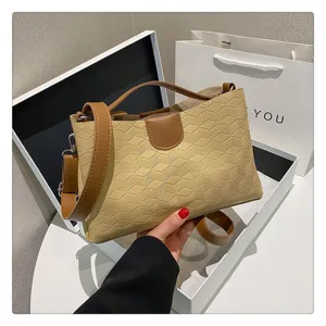 Stylish Korean PU leather shoulder and crossbody handbag with textured geometric design for women.