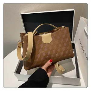 Stylish brown geometric pattern PU leather shoulder bag for women, casual crossbody handbag.