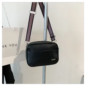 Black PU leather crossbody bag for women with stylish wide striped shoulder strap minimalist