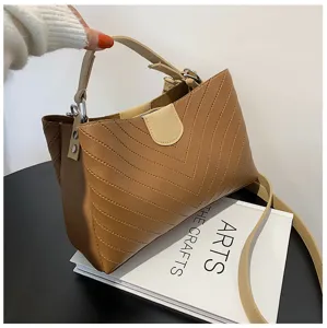 Stylish brown PU leather women shoulder crossbody bag with chevron quilting and top handle.