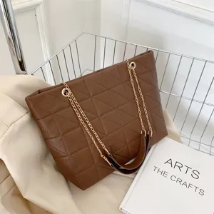 Large capacity quilted shoulder bag for women, trendy chain strap handbag in solid brown.
