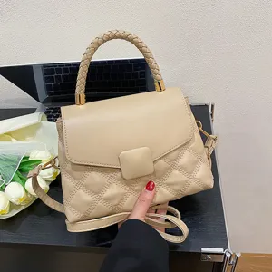 Chic beige quilted flap crossbody bag for women with stylish braided top handle and shoulder strap