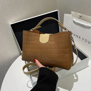 Stylish crocodile pattern women handbag, classic brown tote shoulder bag for daily use.