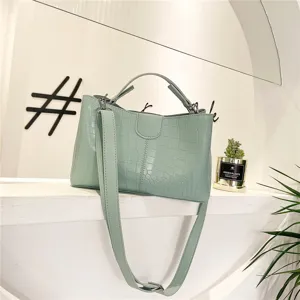 Light green crocodile texture crossbody handbag, stylish women's shoulder tote bag.