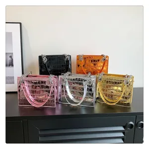 Detailed view of trendy metallic crocodile pattern chain crossbody small square bag for women.