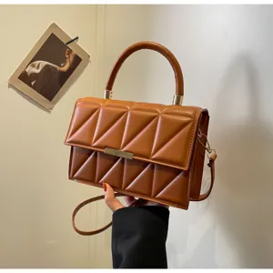 Brown quilted square handbag for women, stylish crossbody bag with top handle and strap.