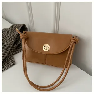 Retro solid color small shoulder bag, stylish casual crossbody bag with twist knot strap.