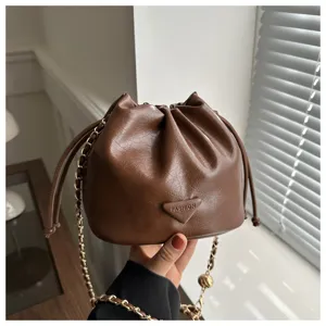 Brown PU leather bucket bag with chain strap, stylish daily shoulder bag for women.