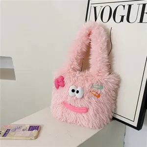 Cute ugly-cute fluffy plush tote bag for women, pink furry shoulder handbag with funny face decor.