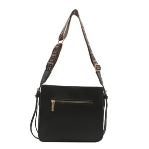 Women black shoulder crossbody bag with wide patterned strap, stylish commute daily handbag.
