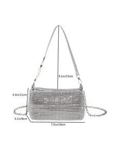 Crystal rhinestone barrel shoulder bag with pearl chain strap, sparkling luxury design.
