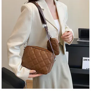 Brown quilted crossbody bag with small pouch, stylish PU leather shoulder handbag detail view.