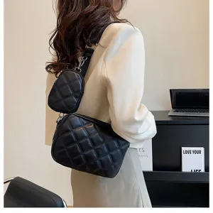 Stylish black quilted crossbody bag with small pouch, elegant PU leather shoulder bag for women.