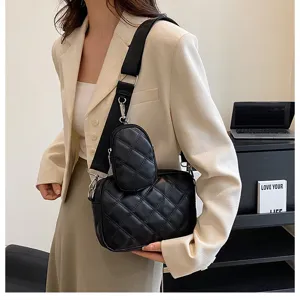 Black quilted crossbody bag with small pouch, trendy PU leather shoulder bag for women.