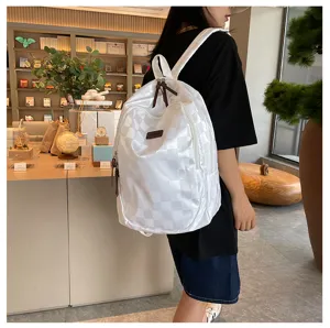 Classic checkered backpack for men and women, trendy casual travel daypack for daily use.