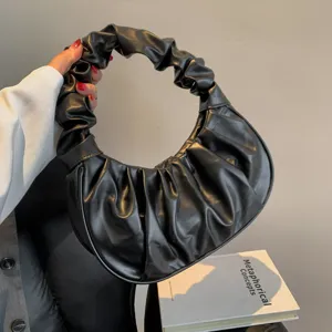 Stylish black pleated cloud handbag for women, minimalist hobo shoulder dumpling purse.