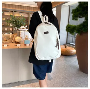 Minimalist solid color canvas casual school backpack for daily travel and students use