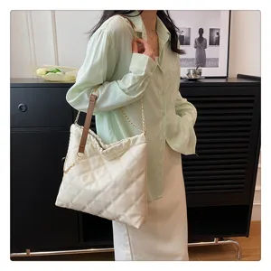 Elegant quilted shoulder bag with chain strap, stylish daily accessory for women.