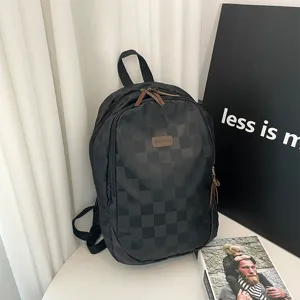 Classic checkered backpack for men and women, trendy student travel daypack with durable fabric.