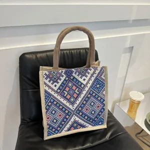 Ethnic style large capacity canvas tote bag, stylish woven geometric shoulder handbag for women.