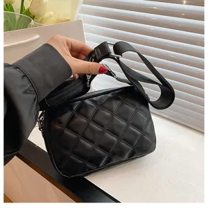 Black quilted crossbody bag PU leather shoulder bag with stylish strap pouch for women.