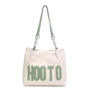 Stylish women shoulder tote bag with chain strap and green letters design for daily use.