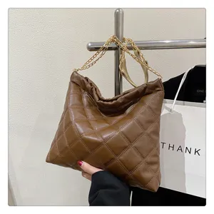 Brown quilted leather chain shoulder bag detail, casual tote style with soft PU material.