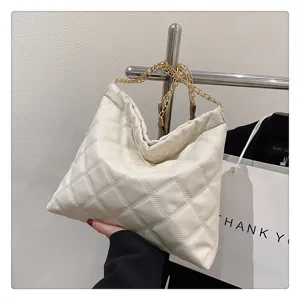 Women's white quilted shoulder bag with gold chain strap, large capacity casual handbag.