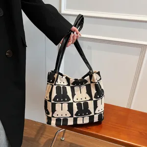 Black and white knitted rabbit pattern tote bag, stylish large capacity shoulder bag for women.