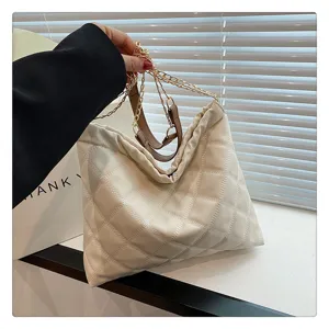 Quilted large shoulder bag detail, cream white PU leather with gold chain strap, stylish daily wear.
