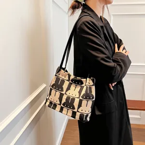 Fashion canvas knitted shoulder bag with cute rabbit pattern, large capacity tote for women.