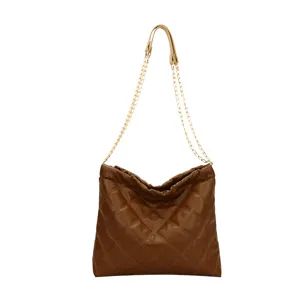 Brown quilted shoulder bag for women, stylish large capacity tote with metal chain strap.