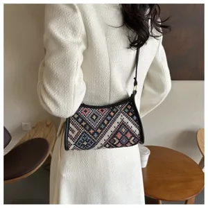 Ethnic geometric embroidered shoulder hobo bag, stylish crescent handbag for women detailing.
