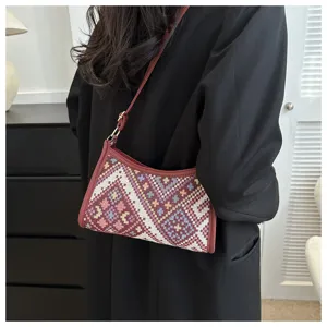 Ethnic pattern underarm shoulder bag detailed view, showcasing woven texture and geometric design.