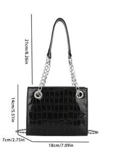 Crocodile pattern chain shoulder bag, black patent leather handbag with metal strap detail.
