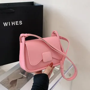 Sac à bandoulière rose pour femme, petit sac à main carré tendance en cuir PU élégant.