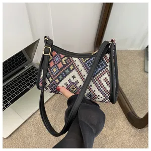 Ethnic woven shoulder bag for women, stylish crescent hobo handbag with adjustable strap.