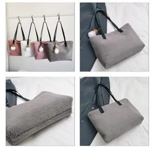 Detailed view of the winter faux fur shoulder bag, featuring soft plush material and chic straps.