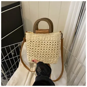Woven straw bucket bag with wooden handles and shoulder strap for women casual summer fashion