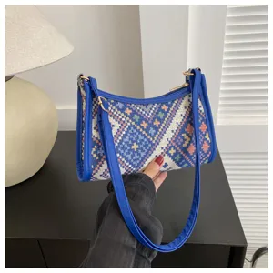 Ethnic woven shoulder crescent bag for women, stylish trendy autumn underarm handbag.