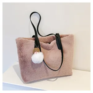 Stylish plush shoulder bag for women, cozy winter tote handbag with fuzzy texture and handles.