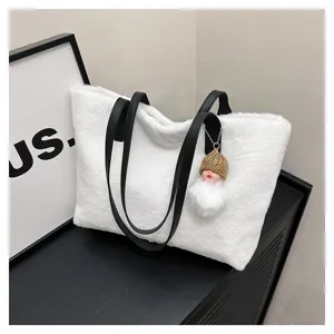 White plush tote bag with black leather handles and cute doll pendant for autumn winter.