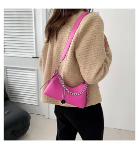 Chic bright pink shoulder bag for women, trendy chain handbag and stylish hobo crossbody purse.