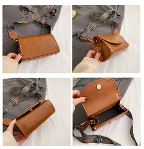 Trendy brown crossbody bag with ethnic wide strap, stylish small square bag for women.