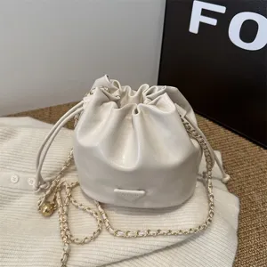 Cream white bucket bag with chain strap, stylish leather crossbody bag for women winter daily