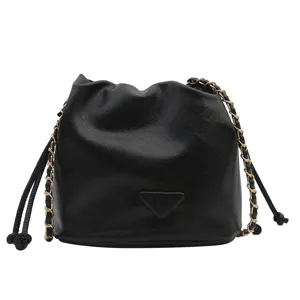 Black leather bucket bag with chain strap, stylish women's shoulder and crossbody bag.