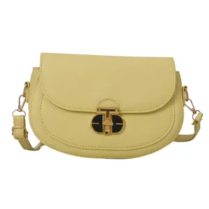Yellow saddle shoulder bag with stylish lock closure and strap for women daily wear.